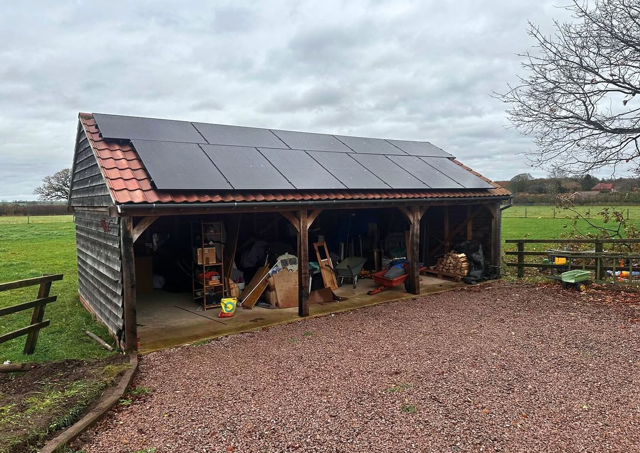 Solar panels on the tiled roof of a timber carport
